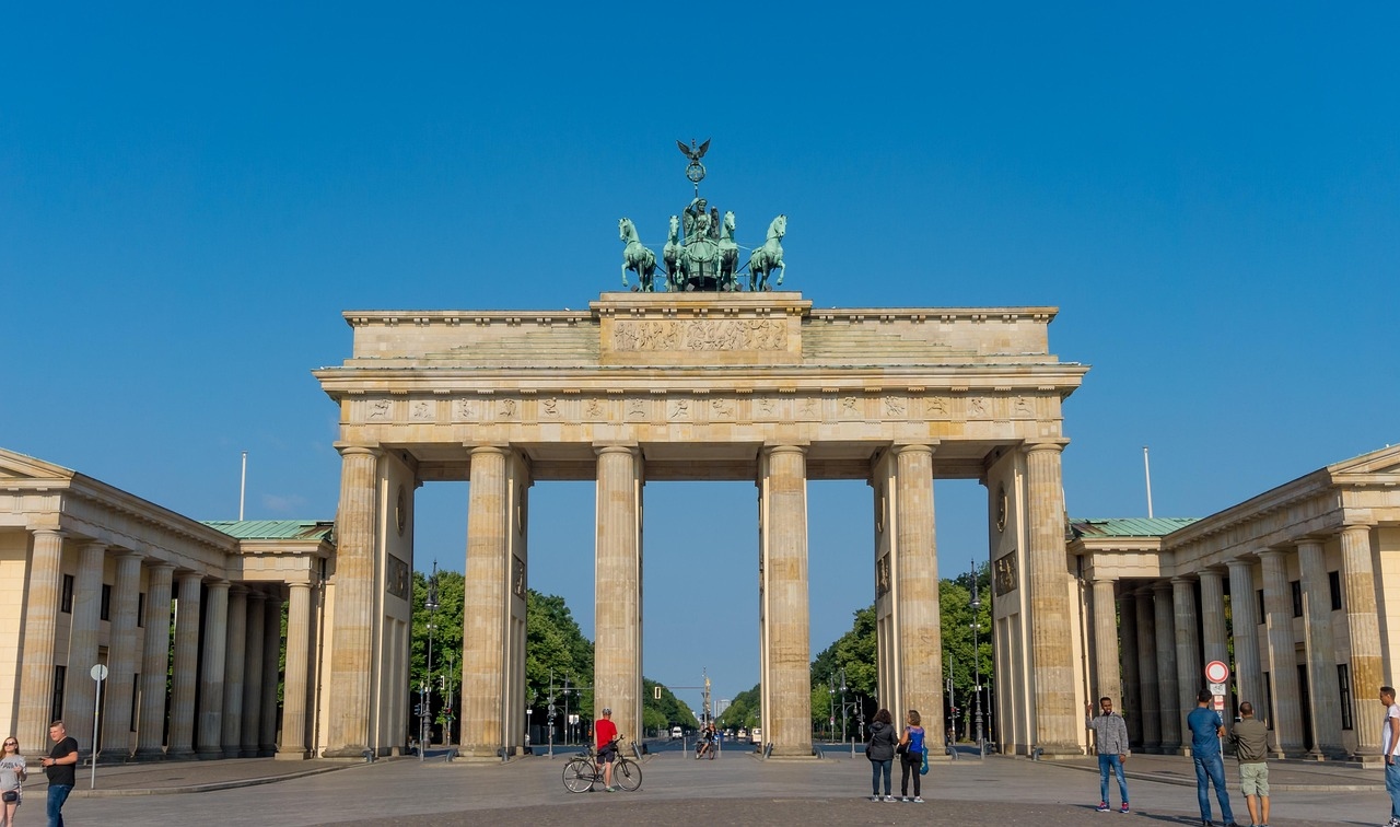 The Brandenburg Gate, a famous neoclassical landmark in Berlin, Germany, featuring tall columns and a chariot sculpture.