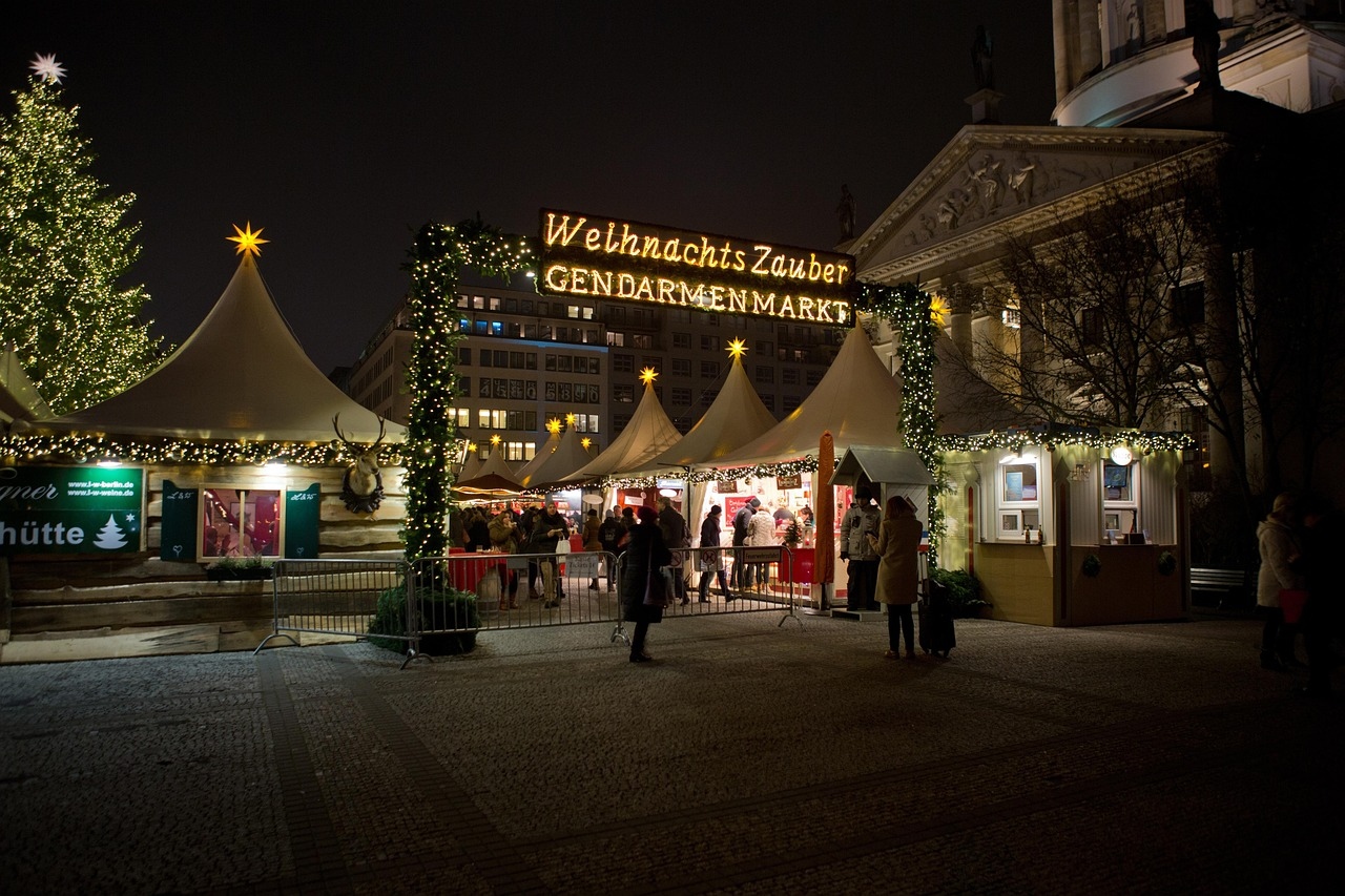 Christmas market at Gendarmenmarkt, Berlin's most beautiful square, featuring festive lights and holiday stalls.