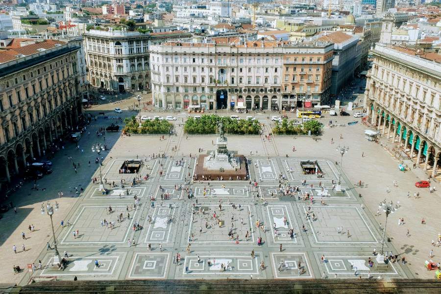 Aerial view of Piazza del Duomo, Cathedral Square in Milan, showcasing the square's architecture and bustling atmosphere.