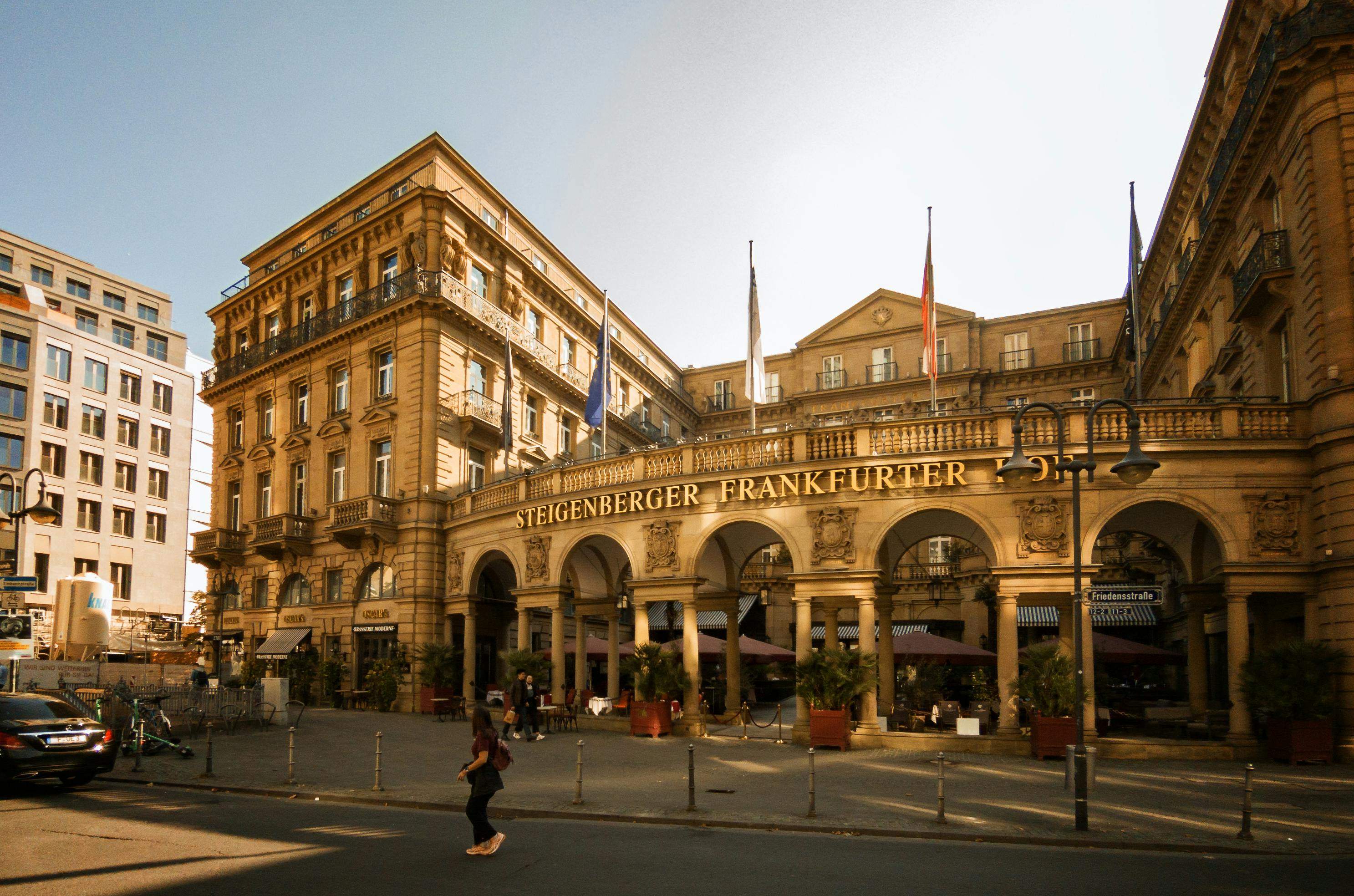 Steigenberger Frankfurter Hof hotel featuring a prominent clock tower and a large clock on its facade.