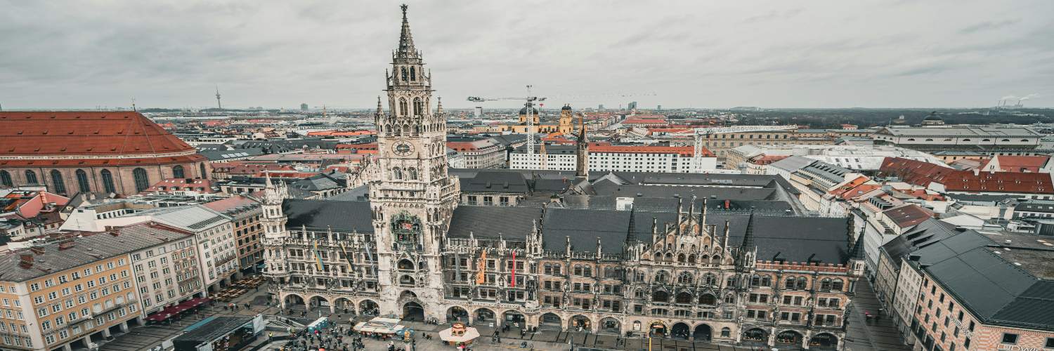 Aerial view of Munich city sightseeing featuring the historic Neues Rathaus building and Marienplatz in Munich, Germany.