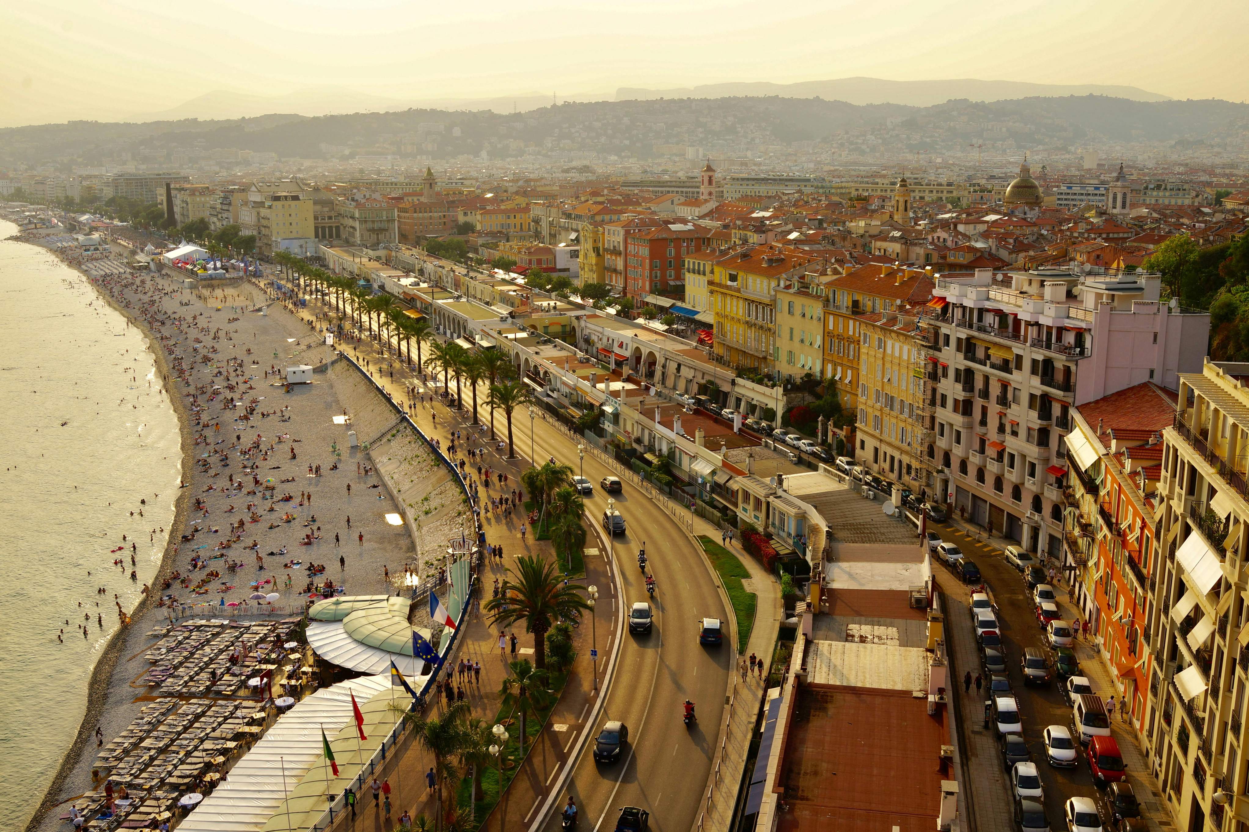 Aerial view of a beach and city, showcasing a vibrant urban landscape and scenic coastline.
