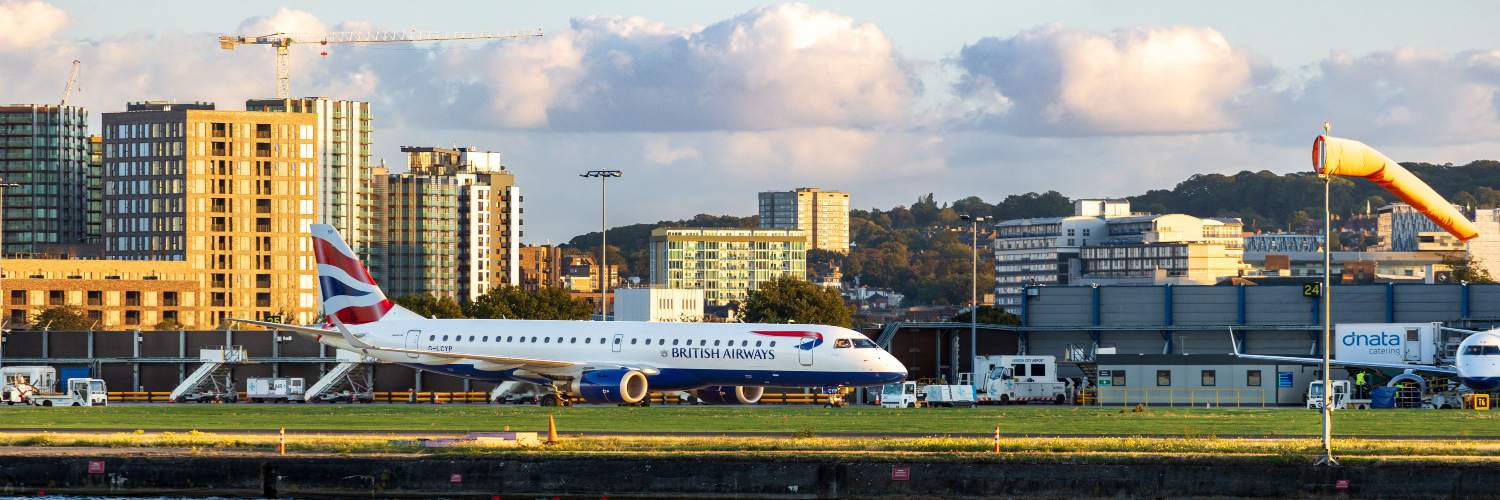 A view of London City Airport, showcasing British Airways aircraft, the largest airline in the UK.