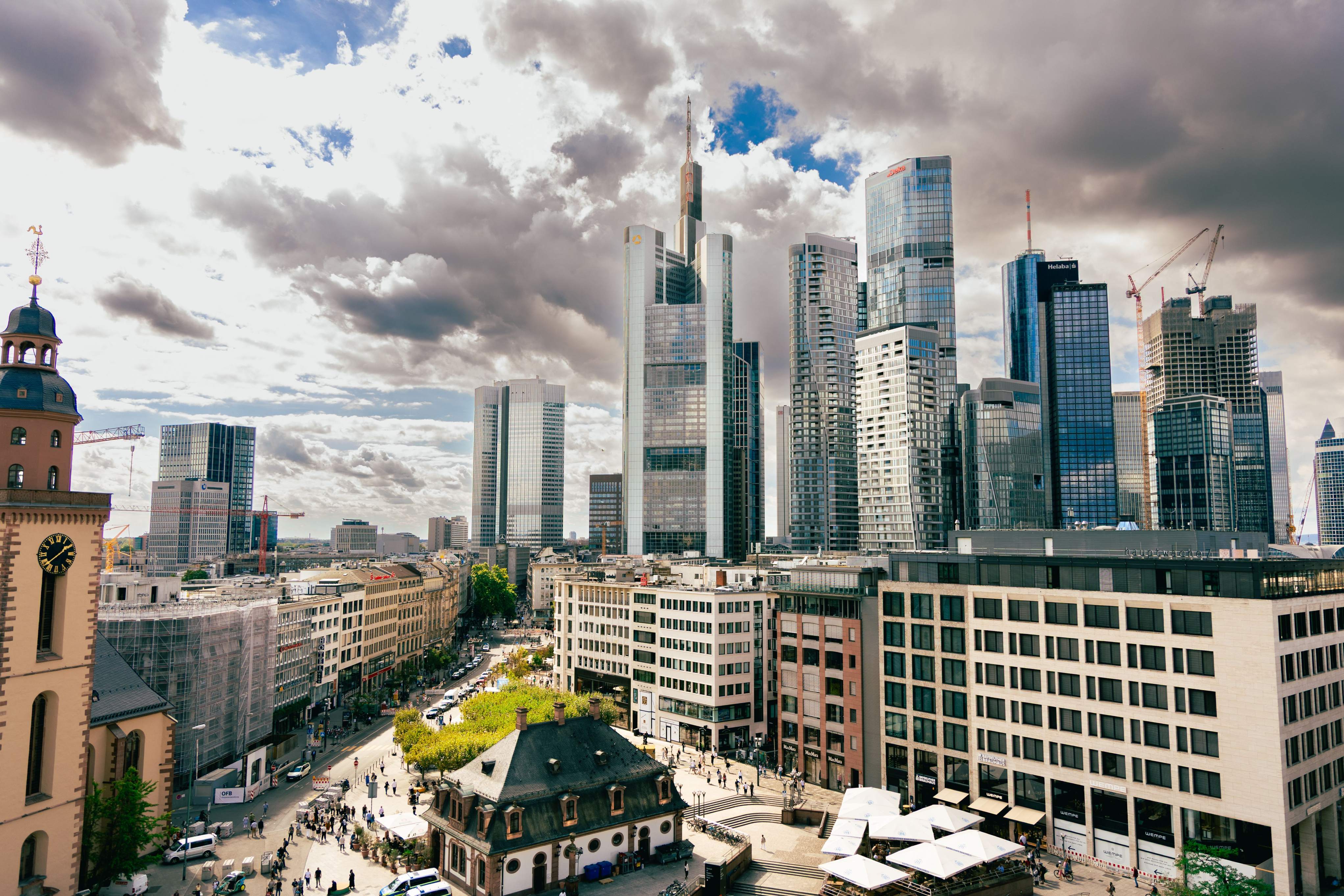 Skyline of Frankfurt, Germany, showcasing modern skyscrapers against a clear blue sky.